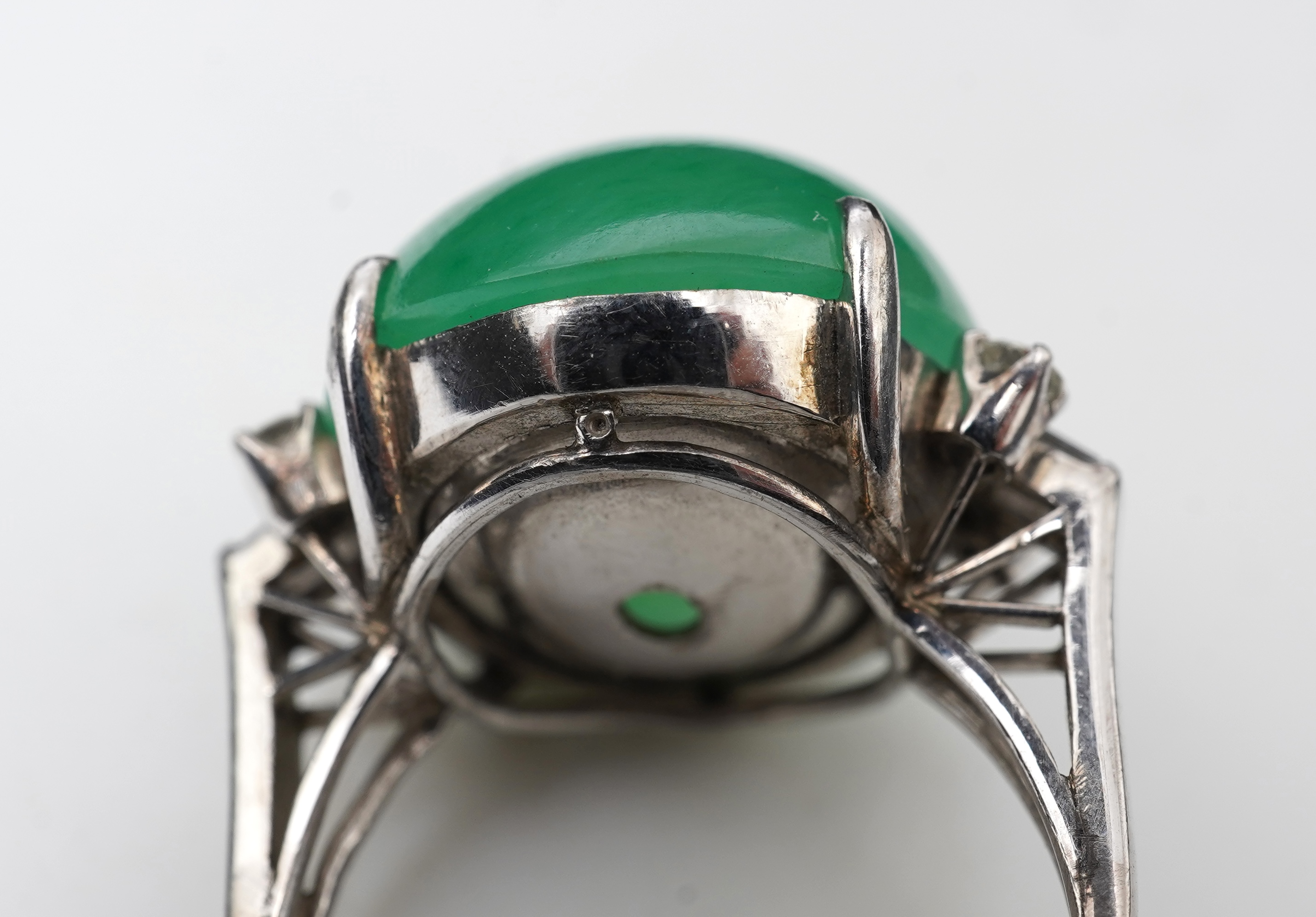A jadeite and diamond ring